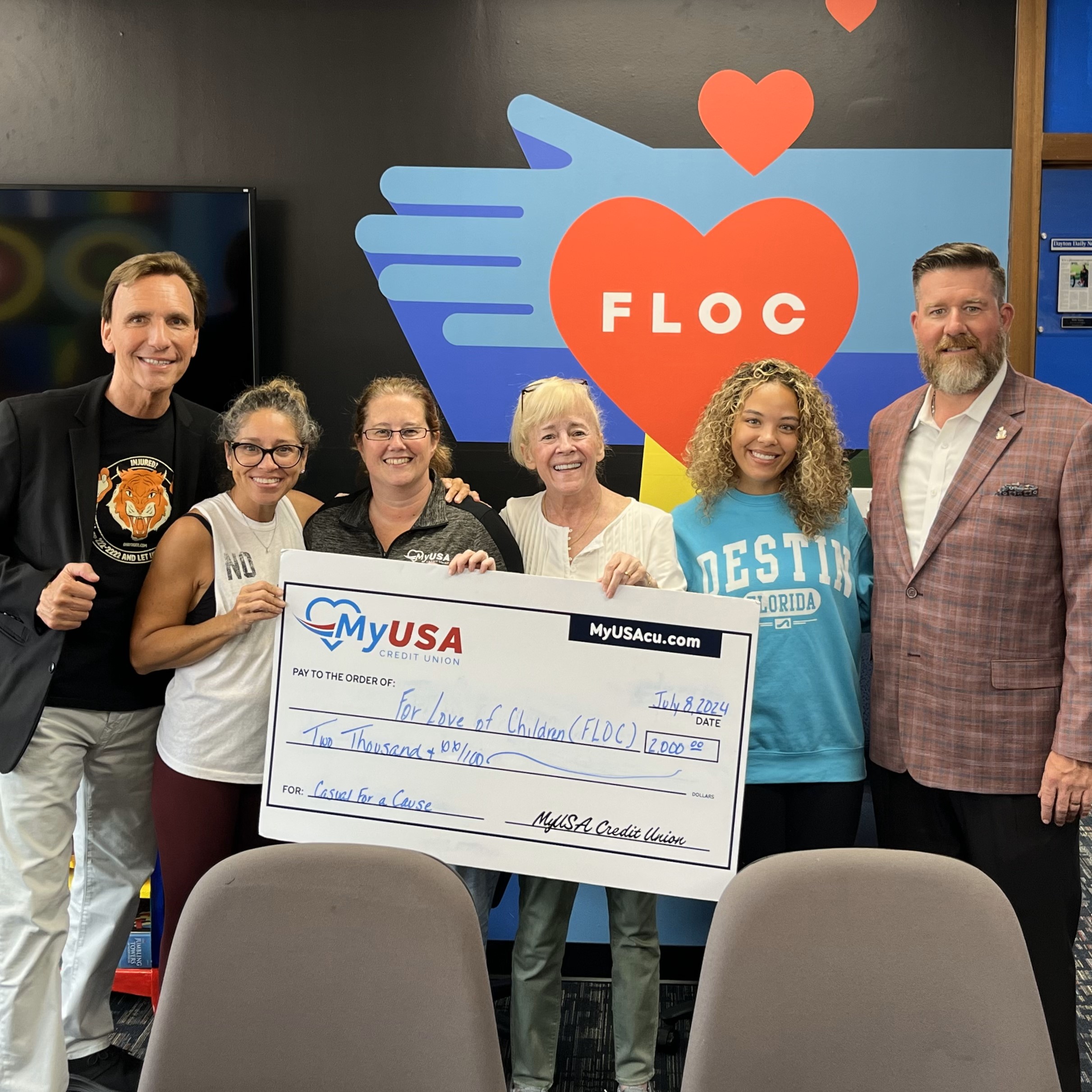 FLOC (For the Love of Children) Check Presentation for Casual for a Cause