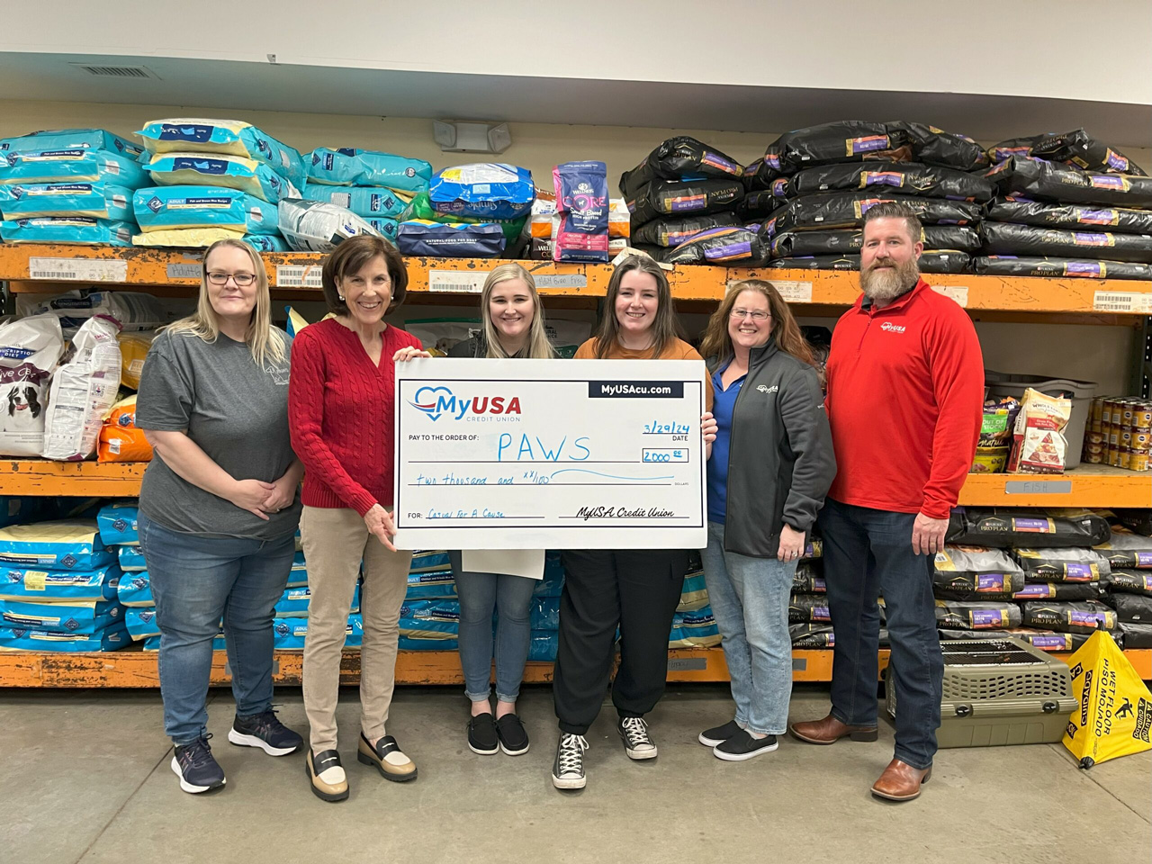 PAWS Adoption Center Check Presentation for Casual for a Cause